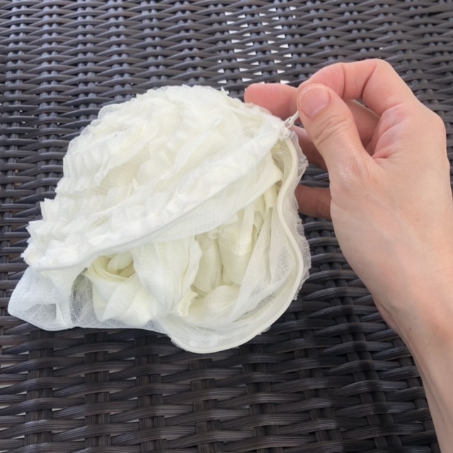 ポケッタブルカーディガン収納