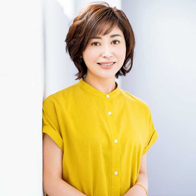硬く広がる髪質をパーマでボリュームコントロールしたショートヘア