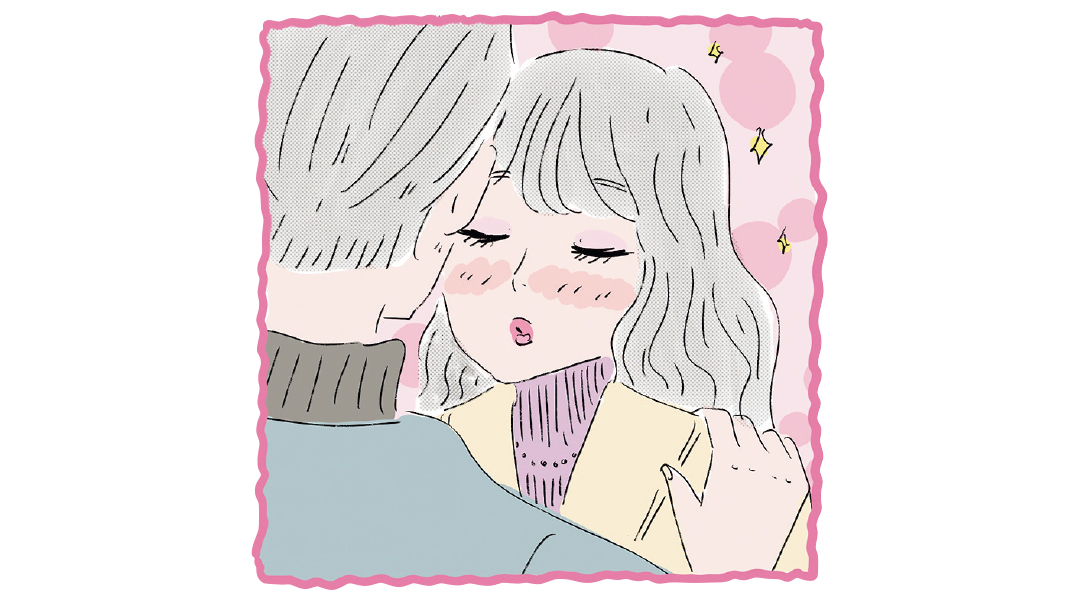 男性にキスをしようしている女性